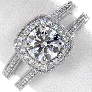 White gold halo engagement ring with two rows of bead set diamonds and cushion halo in Edmonton.