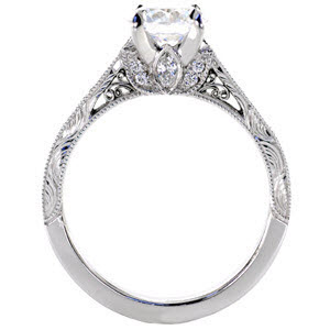 St. Louis engagement ring with hand engraving, filigree and round brilliant center stone.