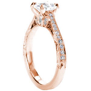 Unique rose gold engagement rings in Milwaukee featuring vintage engagement ring details. This beautiful ring has hand engraving on the sides along with hand formed filigree curls, and petals of diamonds. The top of the band is diamond set. 