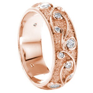 Rose gold wedding ring in Colorado Springs with filigree and bezel set round diamonds.