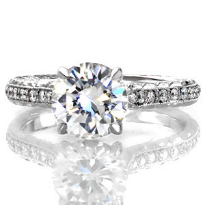 Fresno engagement ring with round brilliant diamond, hand engraving and micro pave diamonds. 