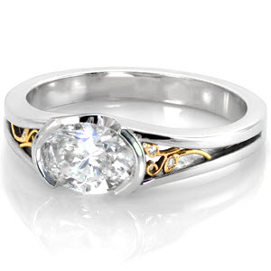 Filigree engagement ring with oval diamond set west to east in Memphis.