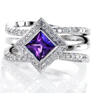 Design 2431 has two energetic bands of split bead set diamonds that frame a single high polished band in 14k white gold. The kite set natural 0.75 princess cut purple sapphire has a full bezel and outlined by a beveled square halo of bead set round diamonds.