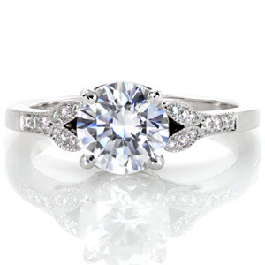 Oakland engagement ring with round brilliant center stone, filigree and micro pave diamonds.