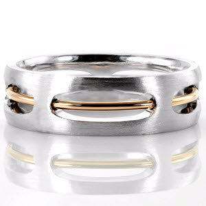 The Centurion wedding band is a unique design that incorporates a round band of 14k rose gold through a wider band of 14k white gold. The rose gold wire has a high polish that accents the brushed finish of the white gold. Five cut out sections add depth to the design.