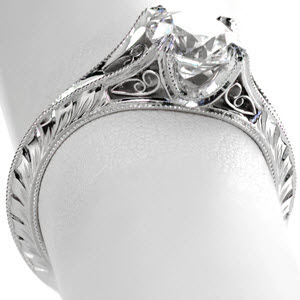 Antique inspired engagement rings with filigree, and engraving and knife edge design in Charleston South Carolina.