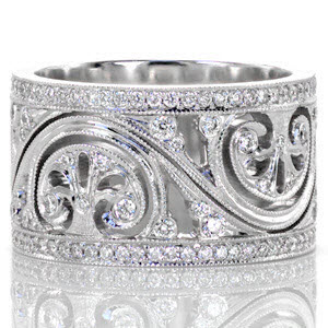 Unique wedding rings in Edmonton featuring an Art Deco pattern. This vintage wedding band design features antique motifs and is detailed with micro pave diamonds.