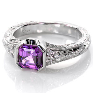 Antique asscher cut purple sapphire engagement ring in Tulsa. This gorgeous purple sapphire is set into an antique engagement ring style with hand engraved details and hand formed filigree curls. 