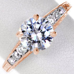 Rose gold engagement ring in New Orleans with hand engraving, milgrain and round center stone.