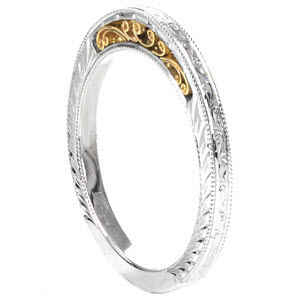 Unique antique wedding band in Chicago. This delightful band is shown as a two tone with a while gold band and yellow gold filigree. Three sides of the band are also detailed with hand engraving and milgrain.