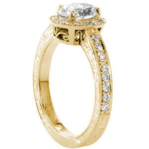 Filigree engagement ring in Cleveland with oval center stone, hand engraving and diamonds.