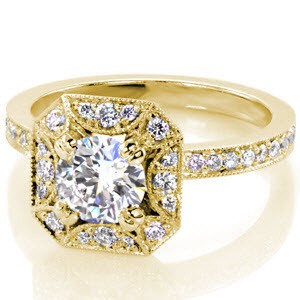 Arlington engagement ring with diamond halo and yellow gold setting.