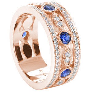 Rose gold wedding ring in Dayton with round blue sapphires, micro pave diamonds and milgrain. 