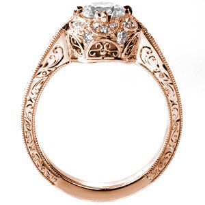 Unique engagement ring in Ottawa with hand engraving, filigree and petal shaped diamond halo.