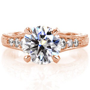 San Jose vintage engagement ring with round brilliant center stone, engraving and filigree.