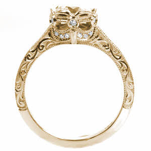 Unique Engagement Rings in Rochester with stunning relief style hand engraving in scroll patterns. The basket of the center setting has a regal air, and is set with diamonds. 