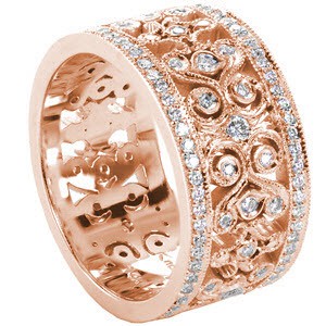 Custom rose gold wide band with bead set diamond rails and scroll patterning in Columbus.