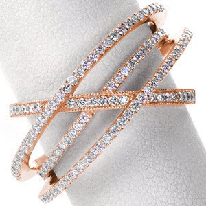 Rose gold wedding ring in Las Vegas with multiple overlapping diamond bands.