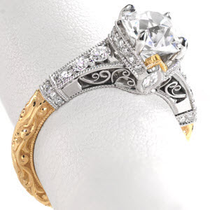 Stunning yellow gold antique engagement rings in Sacramento. This custom engagement two tone engagement ring features an exquisitely relief hand engraved band with micro pave and hand formed filigree in the crown.