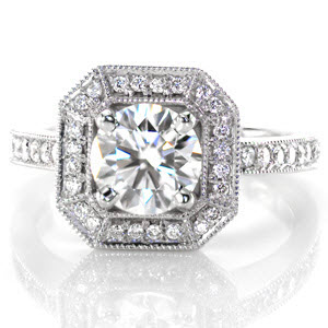 Edmonton halo engagement ring with round brilliant diamond center in an octagon halo.