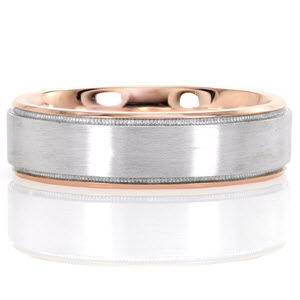 With the warm hue of 14k rose gold, Denver is a modern styled band of sophistication. The design is crisp and unique with a 14k white gold center with brushed finish. Merging the transition between golds, hand applied milgrain unites the design.