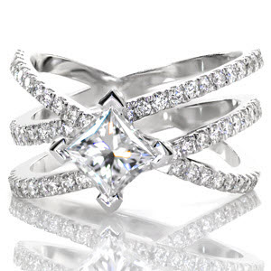 Wide band engagement ring in Tucson with multiple diamond bands and kite-set princess cut.