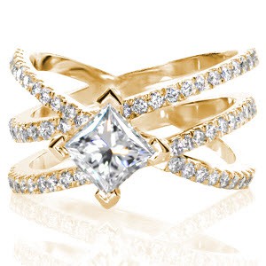 Wide band engagement ring in San Jose with kite-set princess cut center stone.