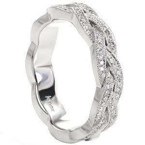 Unique custom wedding band with a bead set diamond braid design edged with milgrain in Colorado Springs.