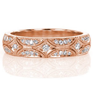 Dazzling rose gold wedding ring in Hartford features a micro pave star burst pattern.