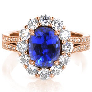 San Francisco custom engagement ring with an oval blue sapphire surrounded by a diamond halo on a split shank band