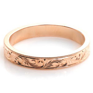 Rose gold wedding ring in Dayton with scroll hand engraving and milgrain border. 
