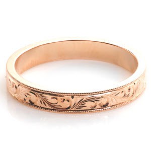 Rose gold wedding ring in Dayton with scroll hand engraving and milgrain border. 