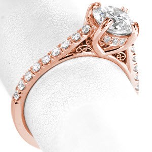 Rose gold engagement ring in Colorado Springs with micro pave diamonds and round brilliant center stone.
