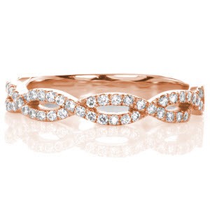 Beautiful twisted stacking band in Madison is hand crafted from rose gold and set with micro pave diamonds.