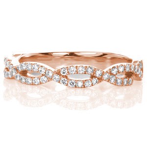 Memphis unique diamond wedding band with round brilliant diamonds along a woven pattern.