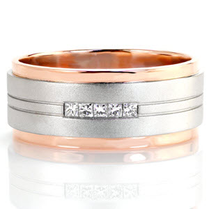 Design 3133 is a bold contemporary wedding band. The elevated white gold center features pin striping details that highlight five square diamonds captured in a channel setting. The cool, sand-blasted matte finish of the white gold contrasts perfectly with the warm hue and high polished luster of the rose gold sides.