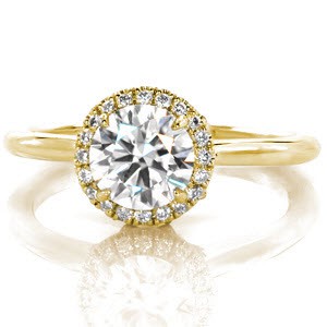 Raleigh halo engagement ring with diamond halo and high polished band.