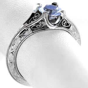 Filigree engagement rings in Denver with Blue Sapphire center stone