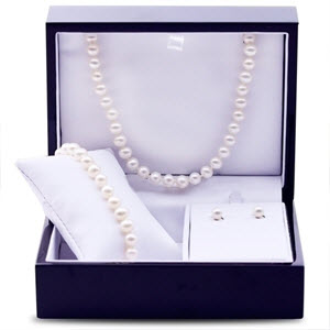 Our classic freshwater pearl set. Includes necklace, bracelet, and a pair of studs. Pearls are near round white freshwater measuring between 6.0-6.5mm. The necklace is 18 inches long, and the bracelet measures 7.5 inches. Nicely finished wooden box is included. Limited Supply.