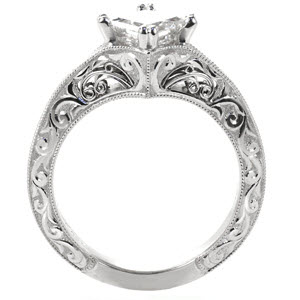 Antique inspired engagement ring with knife edge band featuring scroll relief engraving and filigree in Des Moines.