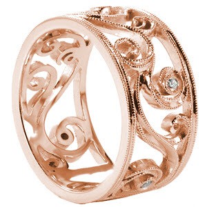 Rose gold wedding ring in Houston with scroll patterns, round diamonds and milgrain texture.