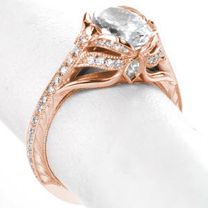 Fargo antique engagement ring with hand engraving in a rose gold setting.