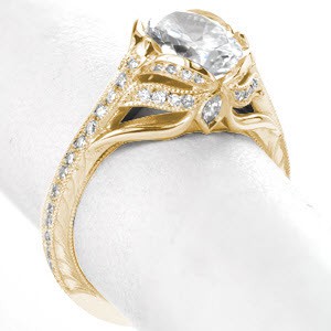 Memphis antique engagement ring with oval center stone, hand engraving and diamonds.