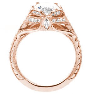 Green Bay custom created rose gold engagement ring with antique inspired details including center petal prongs holding an oval center and arching bead set diamonds.