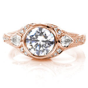 Baton Rouge custom rose gold engagement ring with a unique side profile featuring bead set diamonds and filigree curls.