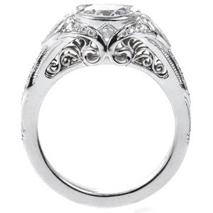 Grand Rapids custom engagement with a round diamond center stone and antique details including profile filigree curls.
