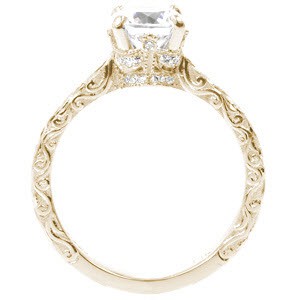 Miami engagement ring with relief scroll engraving and round brilliant center stone.