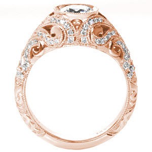 Vintage rose gold engagement rings in Salt Lake City. This gorgeous rose gold ring inspires thoughts of the Great Gatsby with its diamond set swirl filigree patterns.