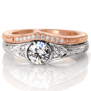 Crafted in 14k rose gold, the Seville Rose Band is adorned with micro pavé diamonds and engraving on the two outside surfaces of the ring. This wedding band is an exact fit to our Seville engagement ring. The band is designed with a soft curve to shadow the outline of the accompanying engagement ring.   