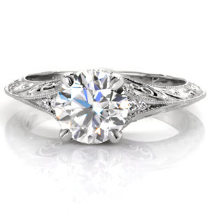 Filigree engagement ring in Raleigh with scroll filigree and round brilliant center stone.